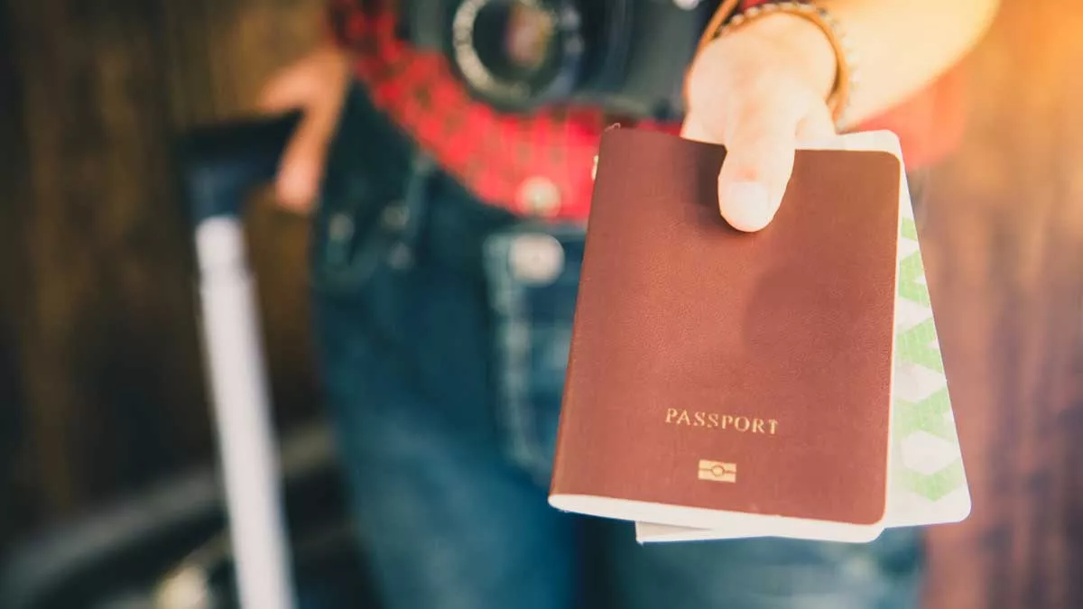 Passport, driving licence, caravan documents and European travel map